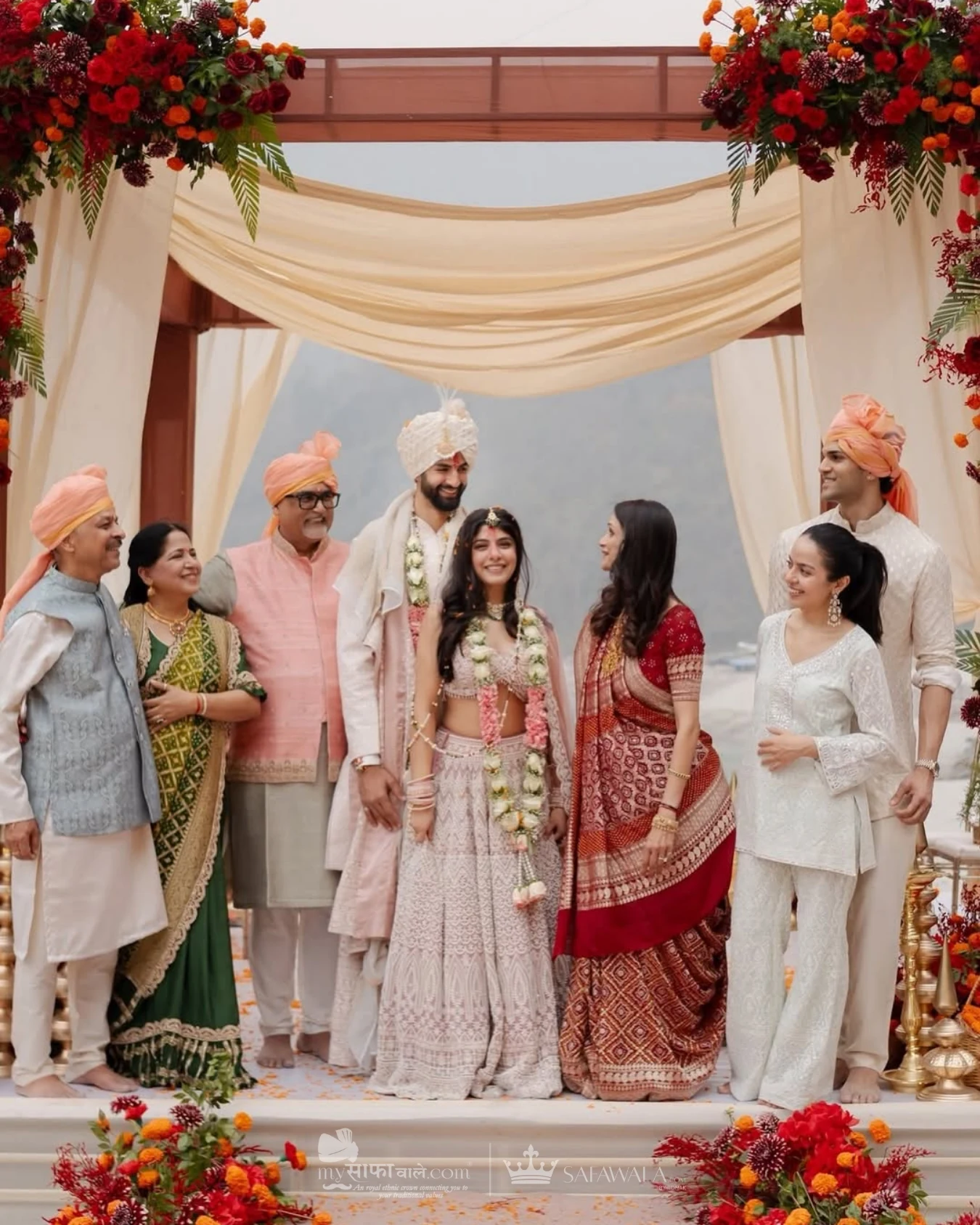 Royal red wedding safa and embroidered groom styling for Adyar